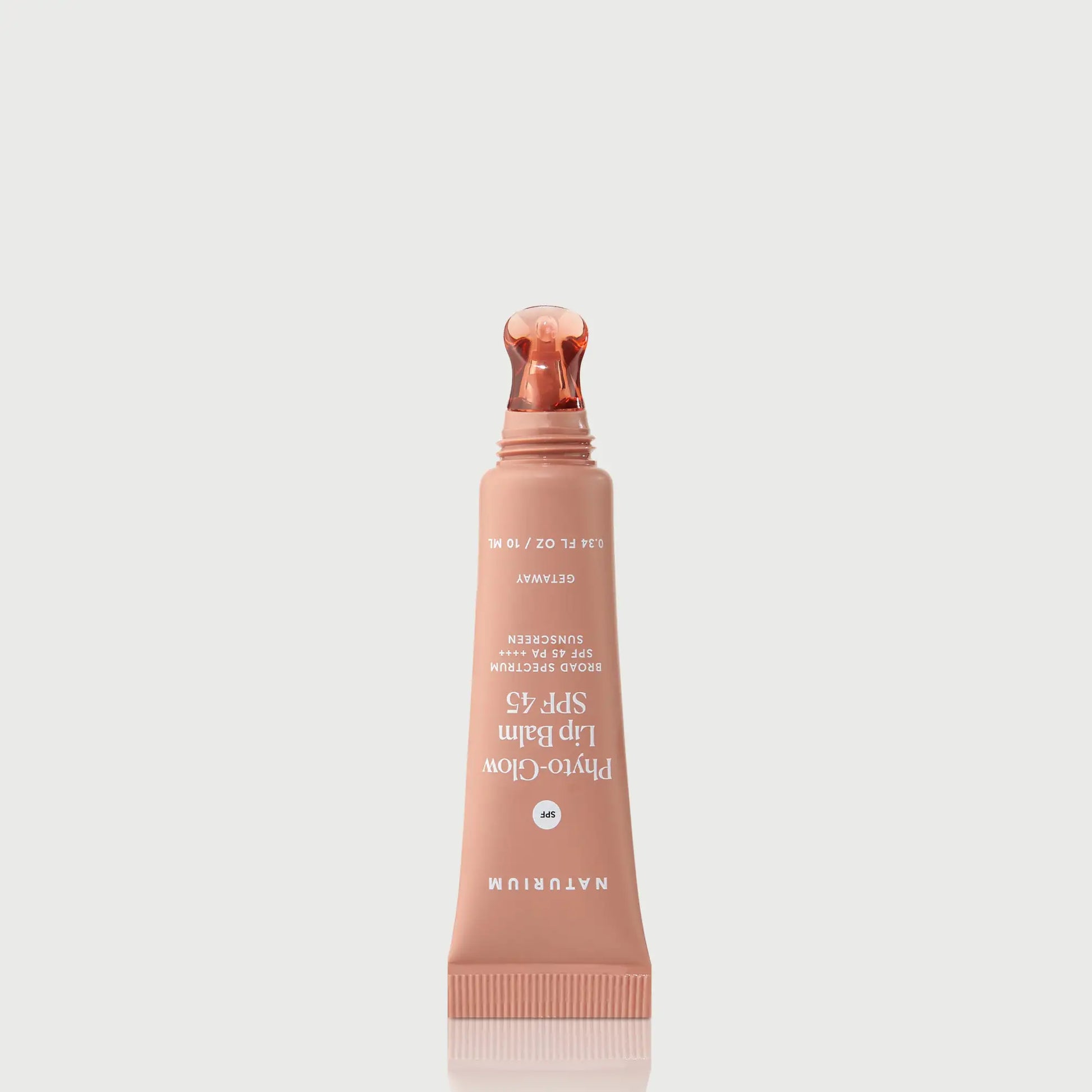 phyto-glow-lip-balm-spf-45-getaway-j9 NATR-10126_PhytoGlow_SPF_Getaway_primary_nocap_bonebkgd_1.webp