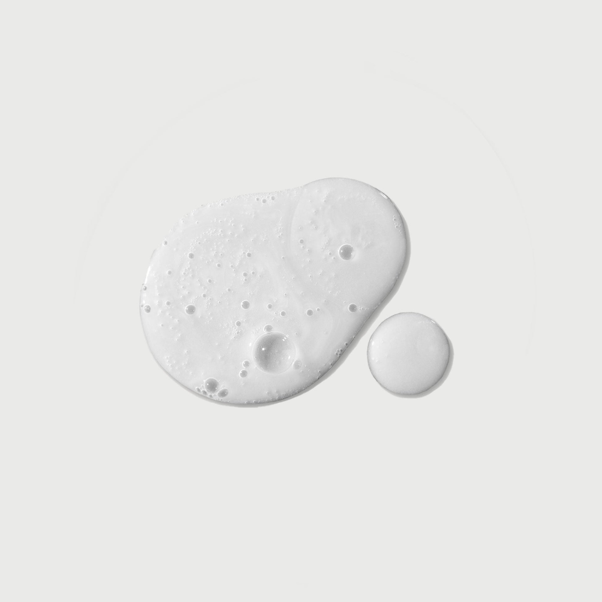 the-purifier-niacinamide-serum-body-wash-z5 NATR-40012-Swatch-The-Purifier-Niacinamide-Serum-Body-Wash-bonebkgd.jpg